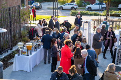 Guests enjoy an outdoor reception in the Price Family Amphitheater